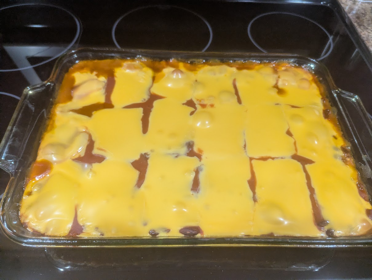 Shipwreck casserole with melted cheese on top